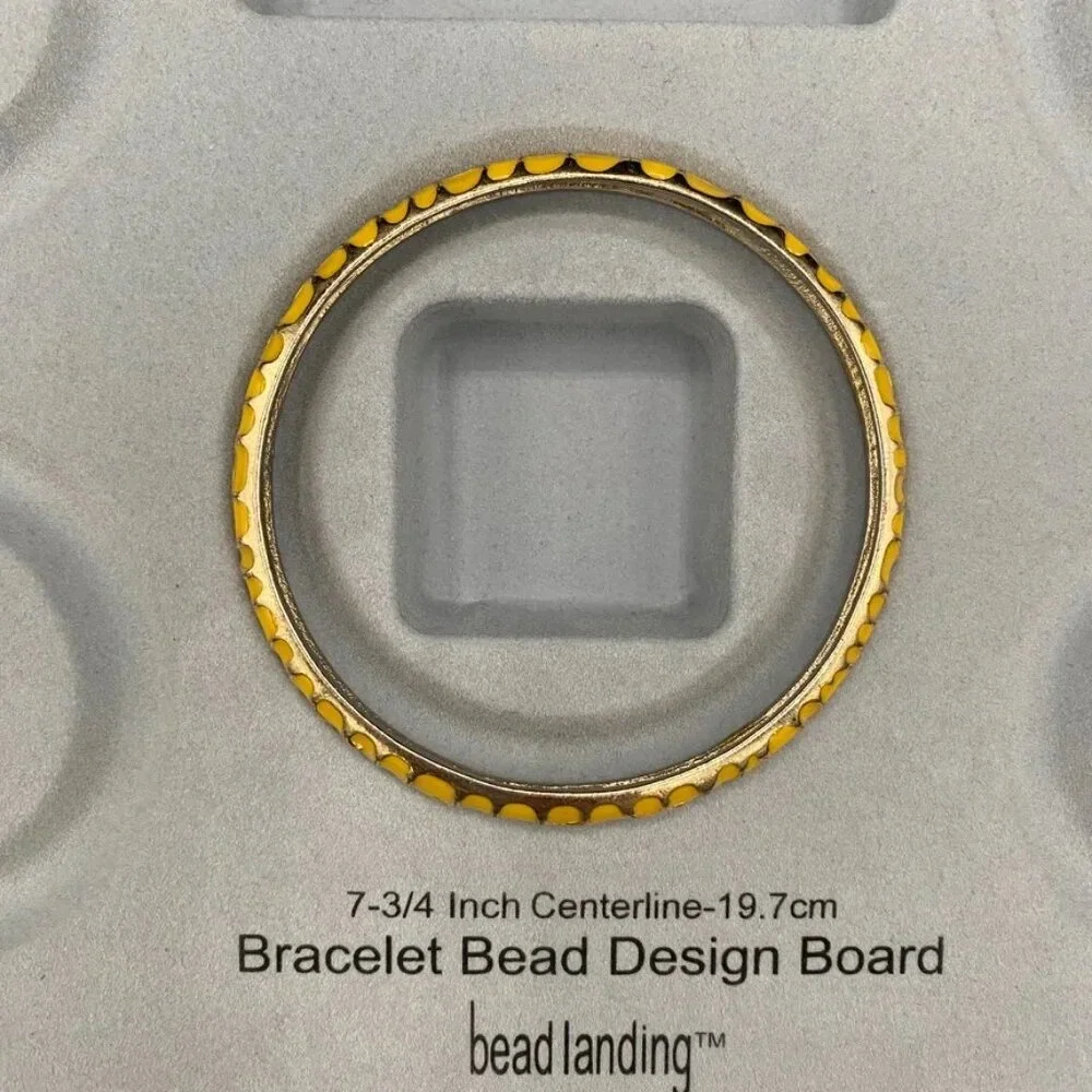 Gold enamel stacking bangle bracelet set in gold tone